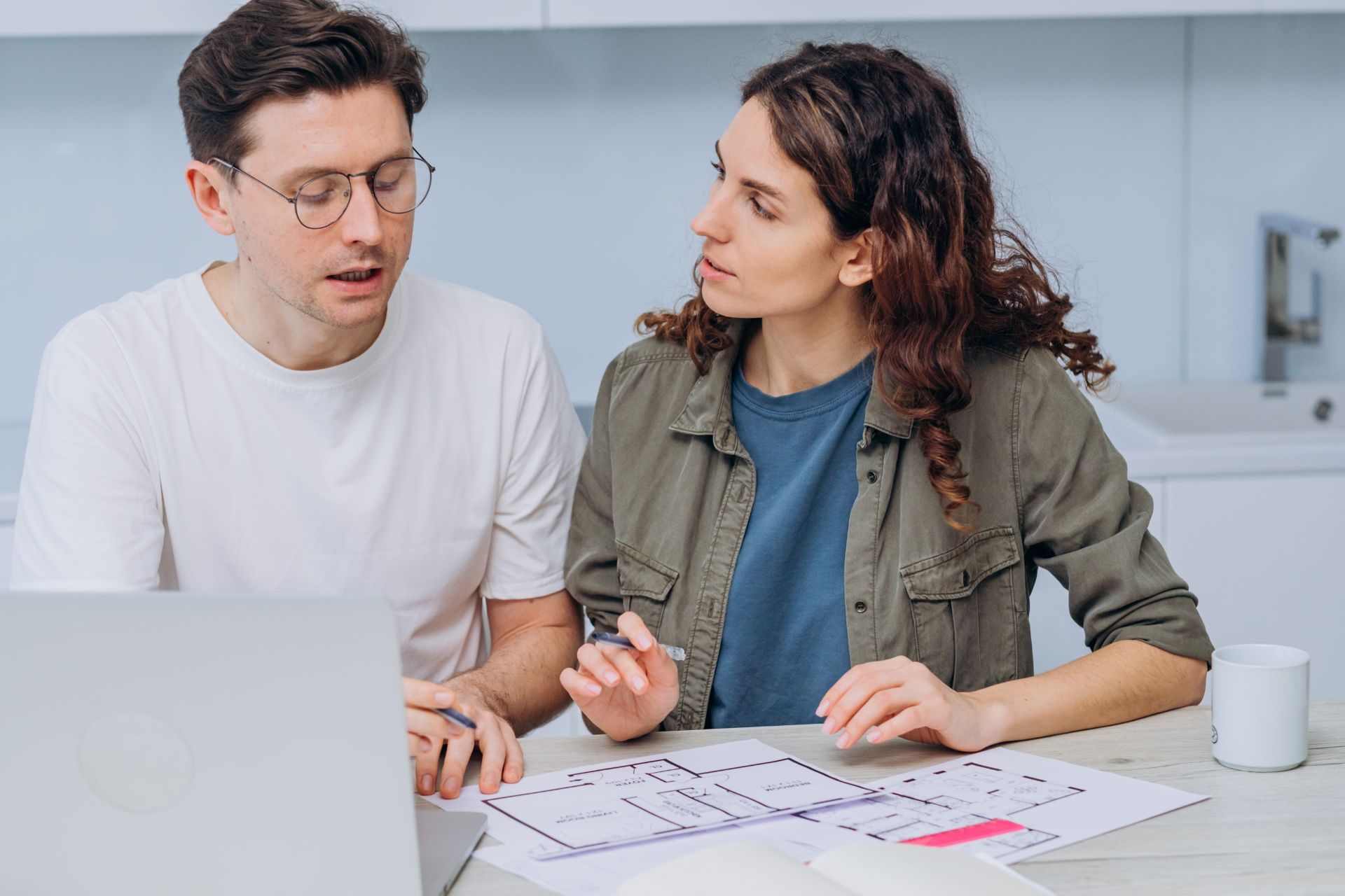 Couple discussing over renovation budgeting