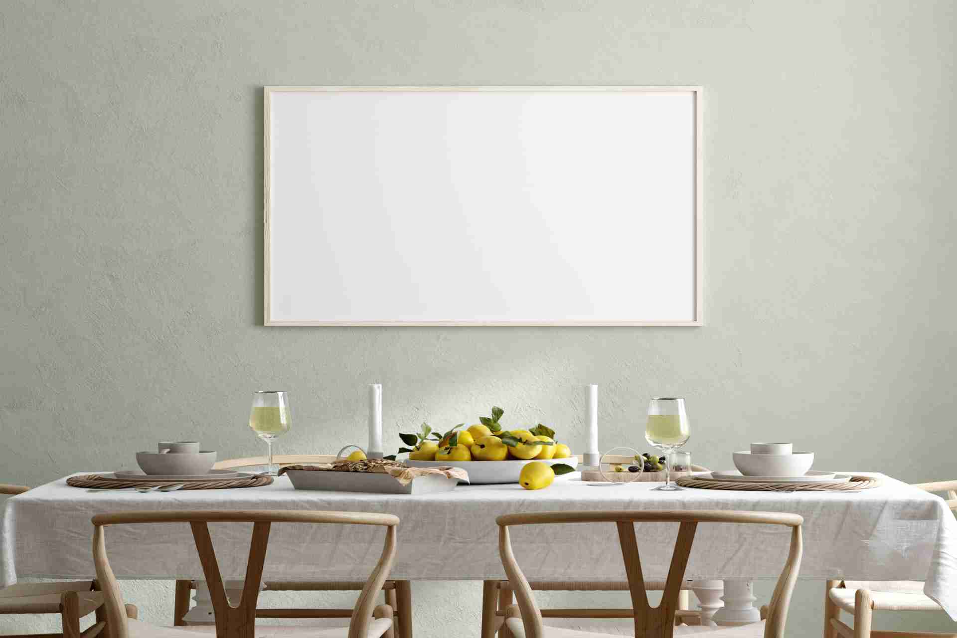 minimal dining setup with framed wall art