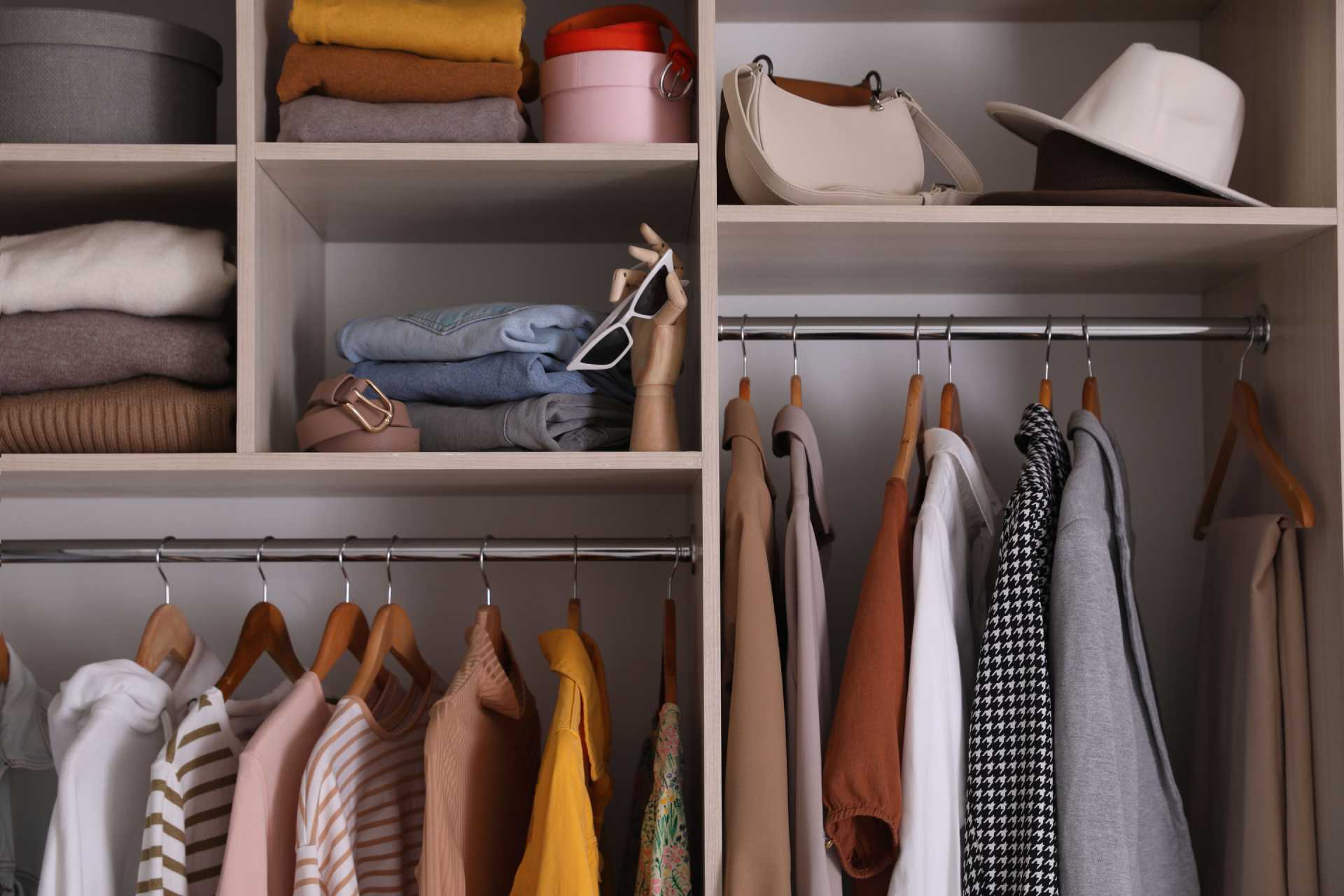 neatly organised wardrobe for easy decluttering