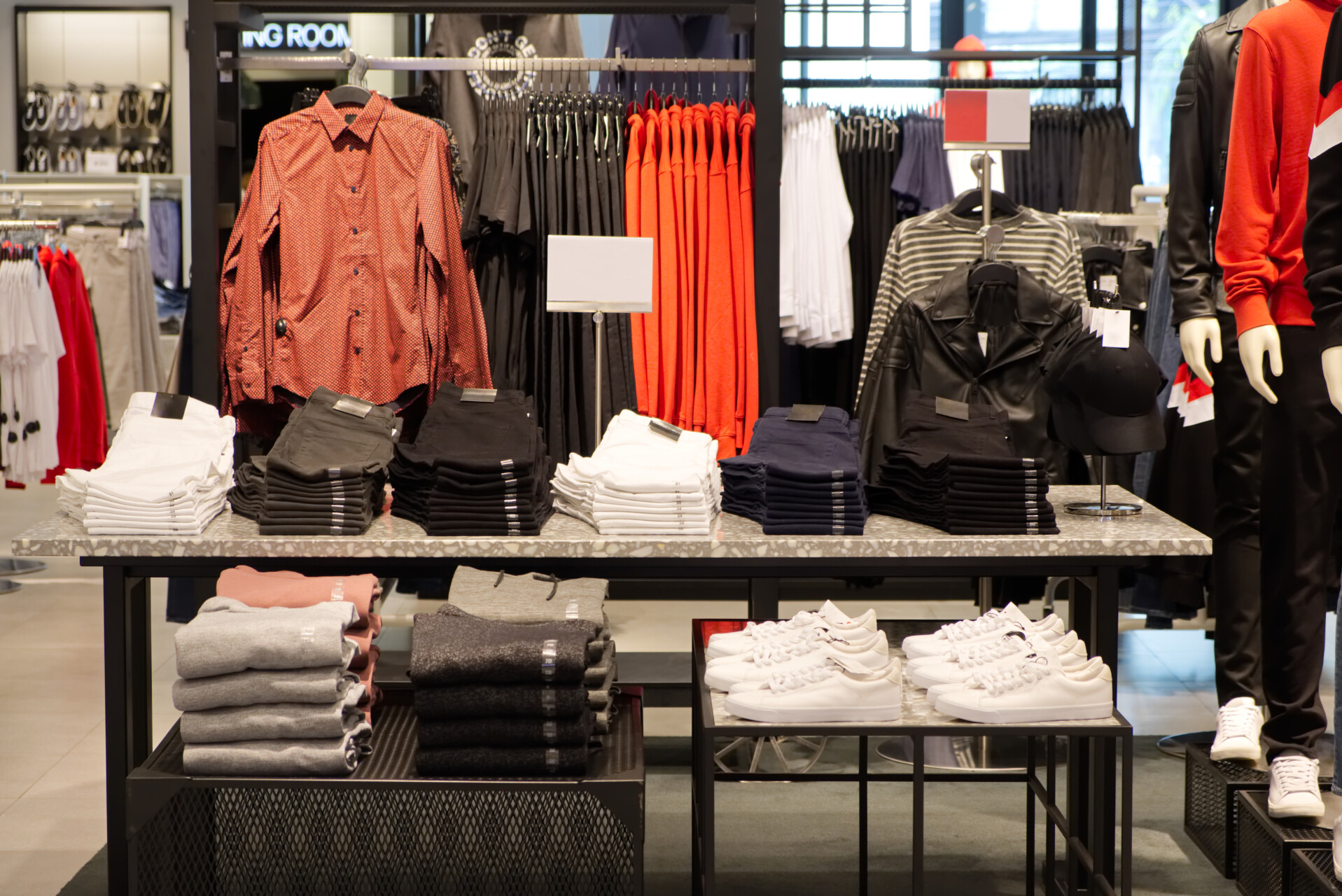 fashionable clothes stacked neatly in retail store 2026 09 22 03 24 11 utc